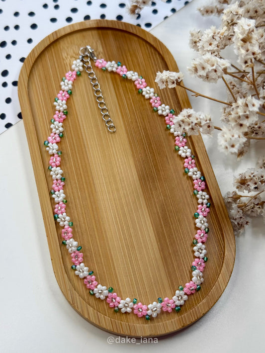 Beaded necklace with pink and white flowers