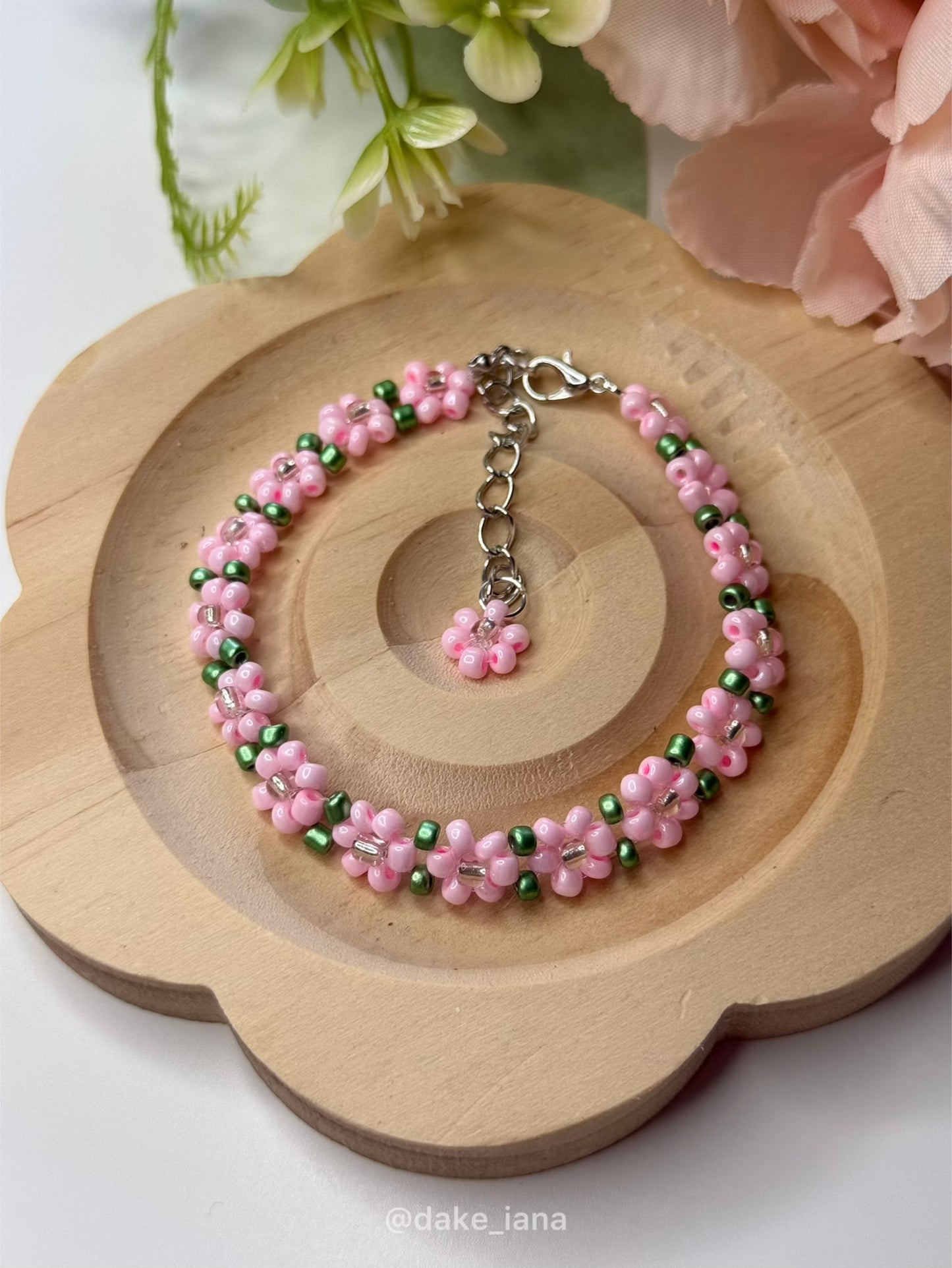 Handmade Pink Flower Beaded Bracelet with Green Accents