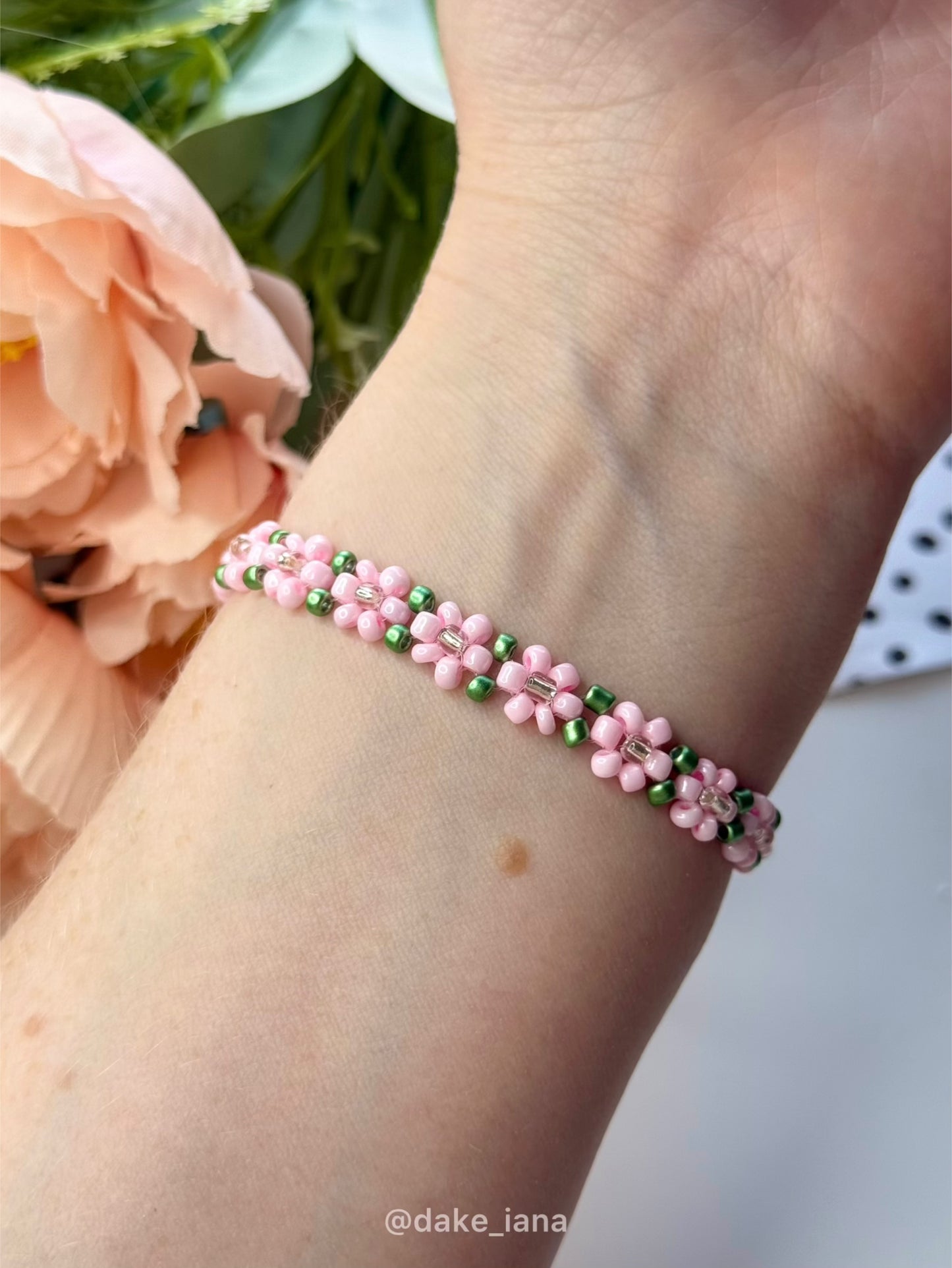 Handmade Pink Flower Beaded Bracelet with Green Accents